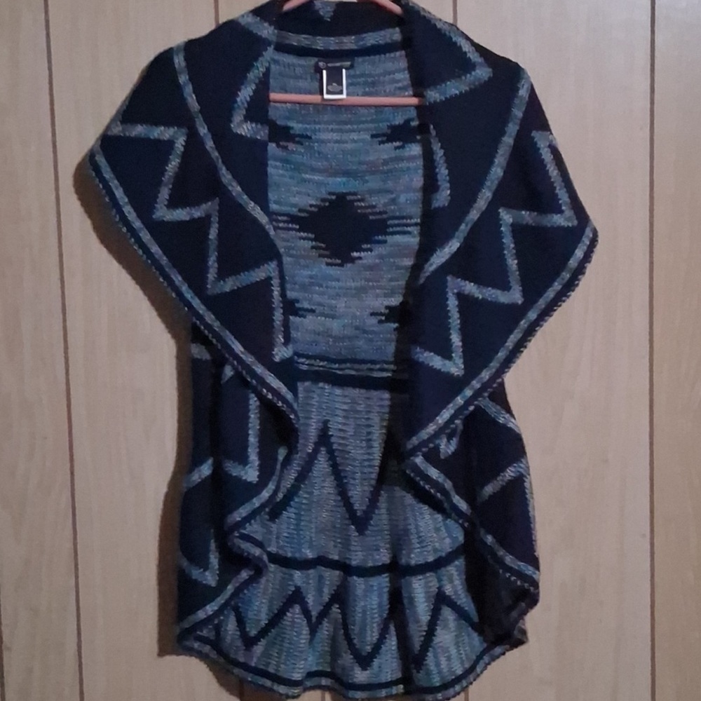 Tribal Open Front Cardigan
Sweater Vest.
